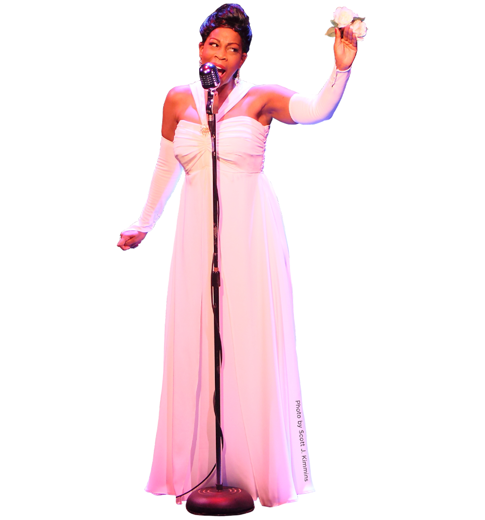 Culture Works artist performing on stage singing into a mic